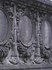 Downturned torches or flambeaux